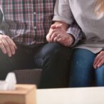 Couple holding hands